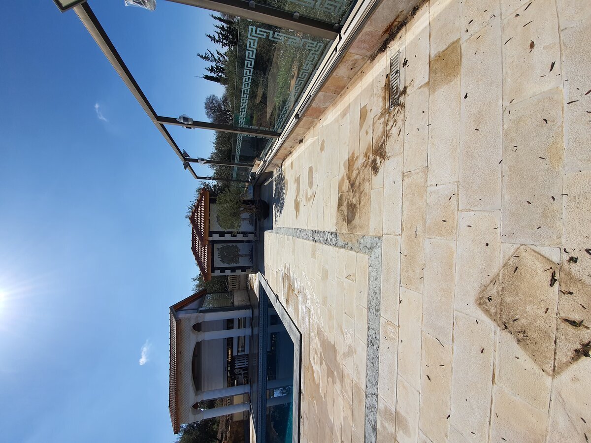 Pool pavilion and terrace — surveyed before new stone cladding and landscape works