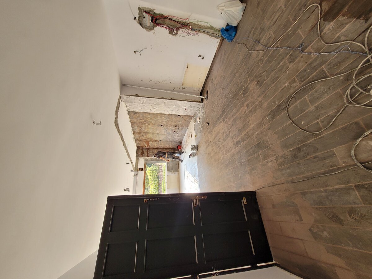 Ground floor stripped back — open plan zone ready for MEP runs and new floor screed