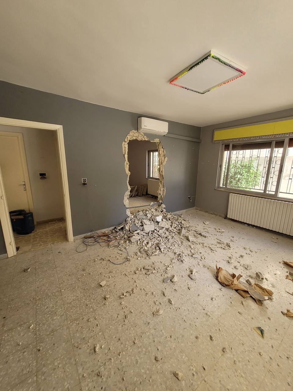 Internal demolition — wall removal to reconfigure floor plan
